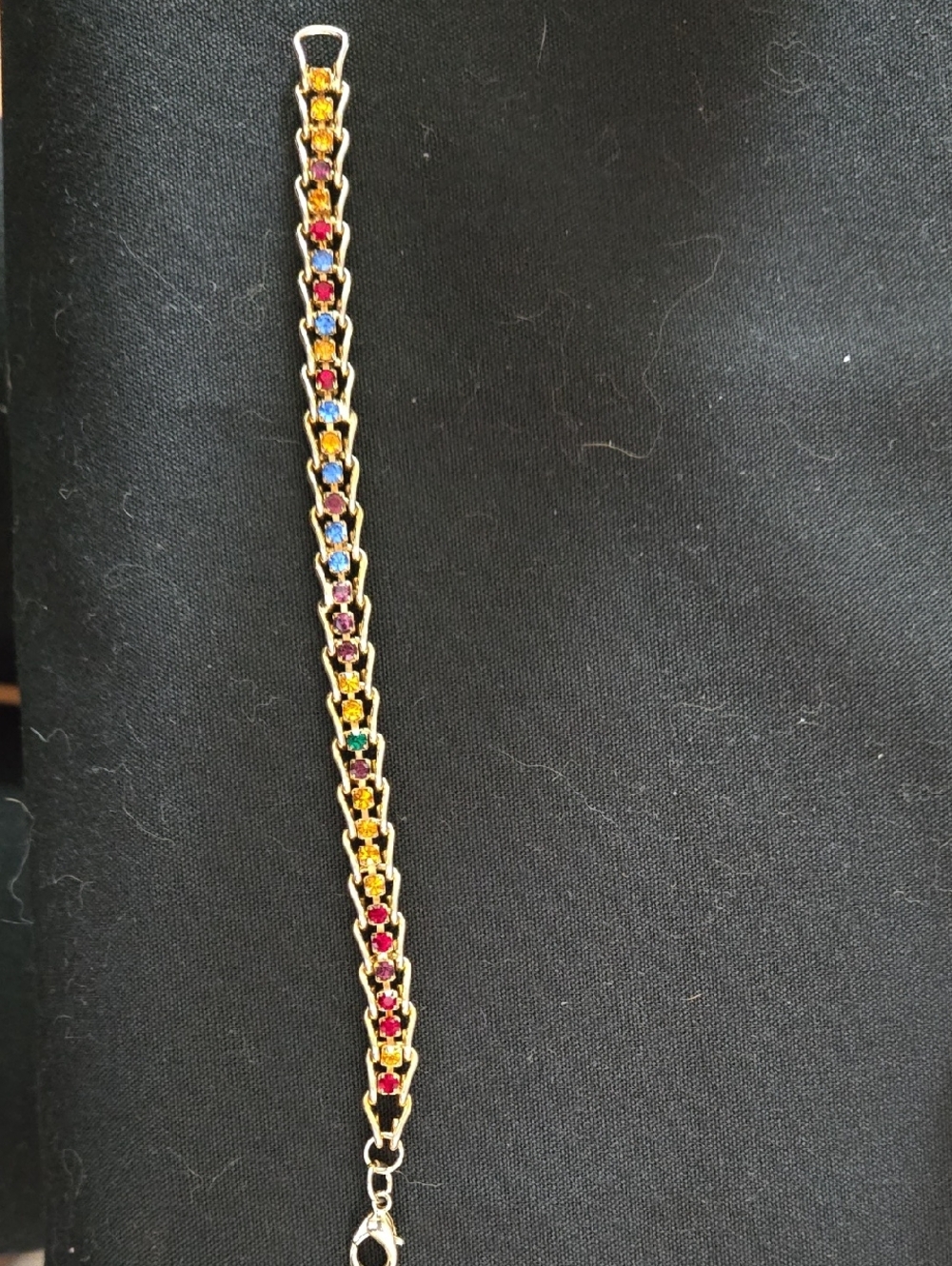 Gold-Tone Multistone Bracelet with Blue, Red, Green and Gold Accents 6.75"